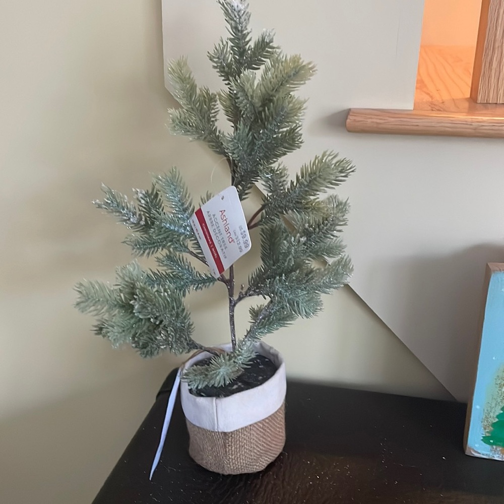 Small holiday tree to adorn a tabletop or shelf.